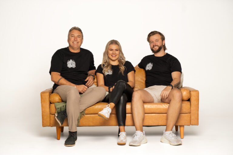 a picture of the rani team sitting on a couch together