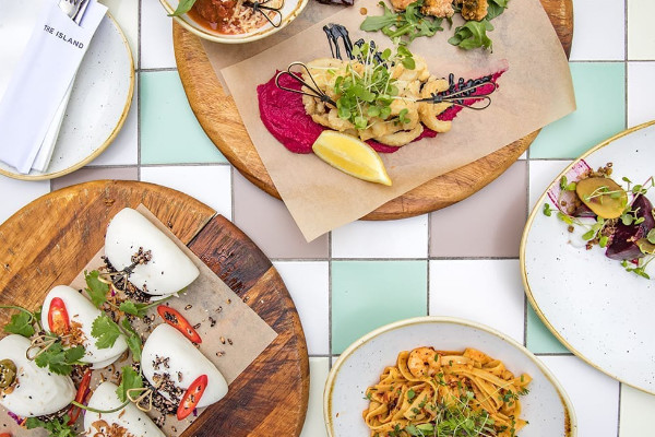 An image of a variety of foods presented at a bottomless brunch